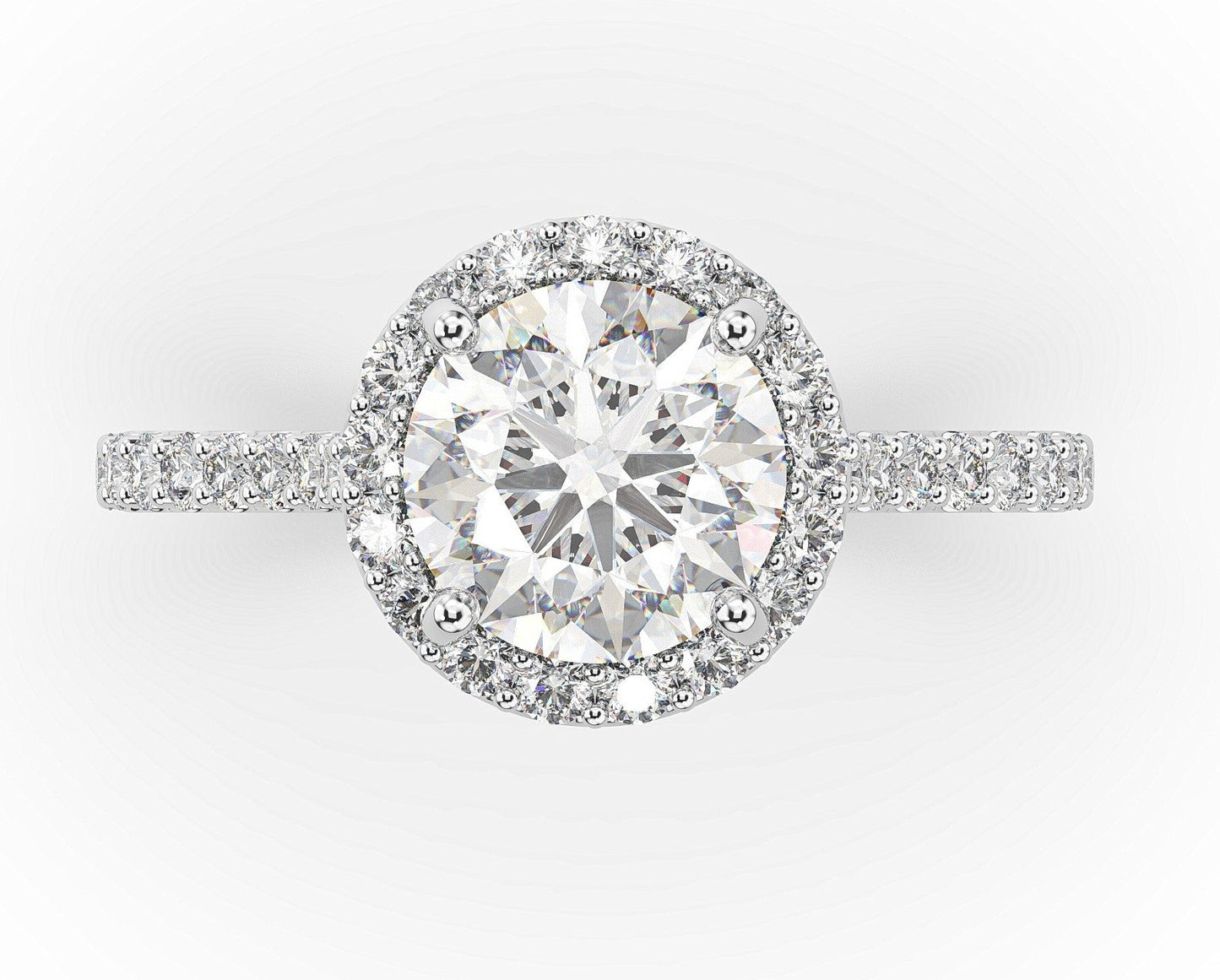 Round Brilliant White Gold Halo Style Engagement Ring 