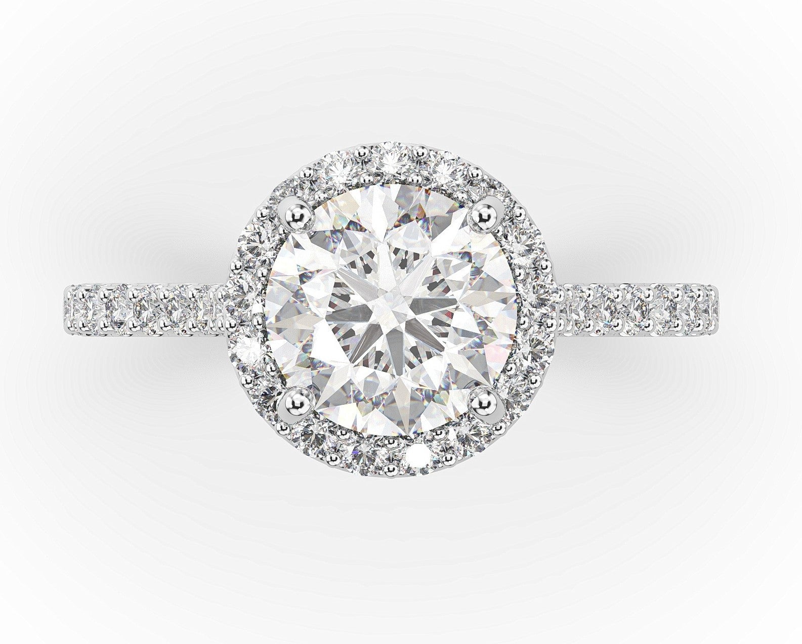 Round Brilliant White Gold Halo Style Engagement Ring 