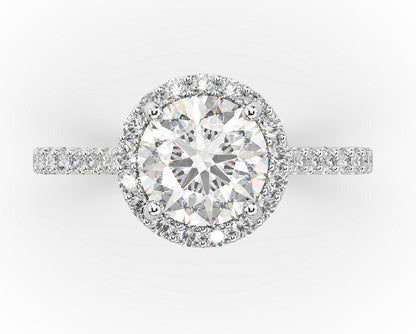 Round Brilliant White Gold Halo Style Engagement Ring 
