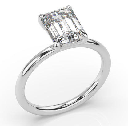 Four Claw White Gold Emerald Solitaire Engagement Ring