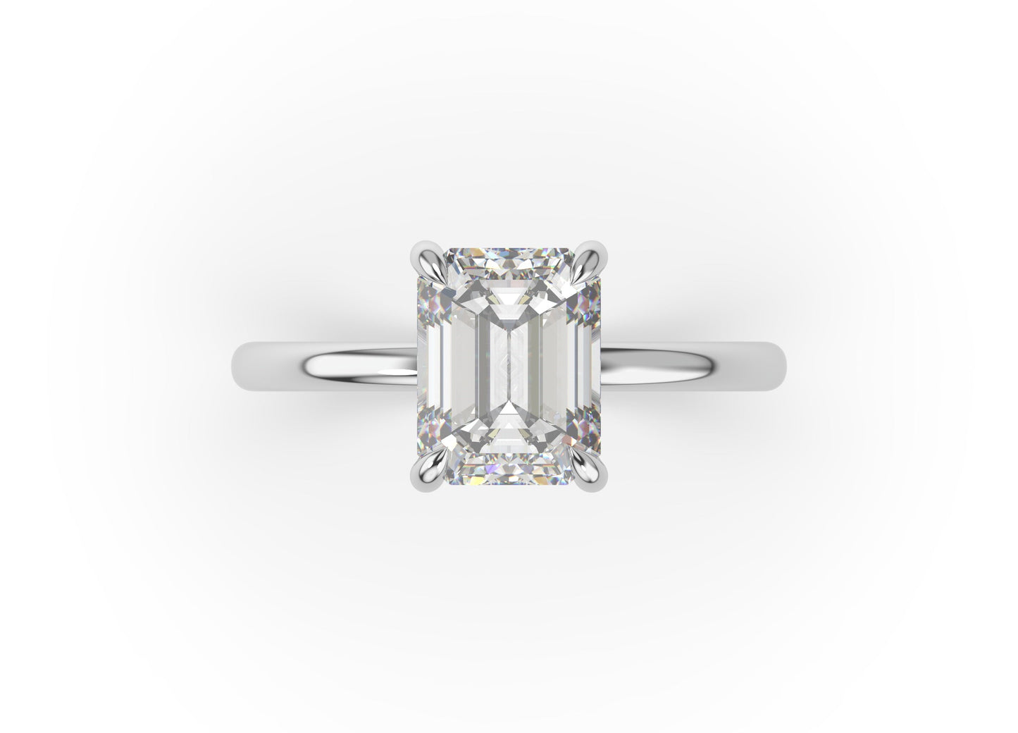 Four Claw White Gold Emerald Solitaire Engagement Ring