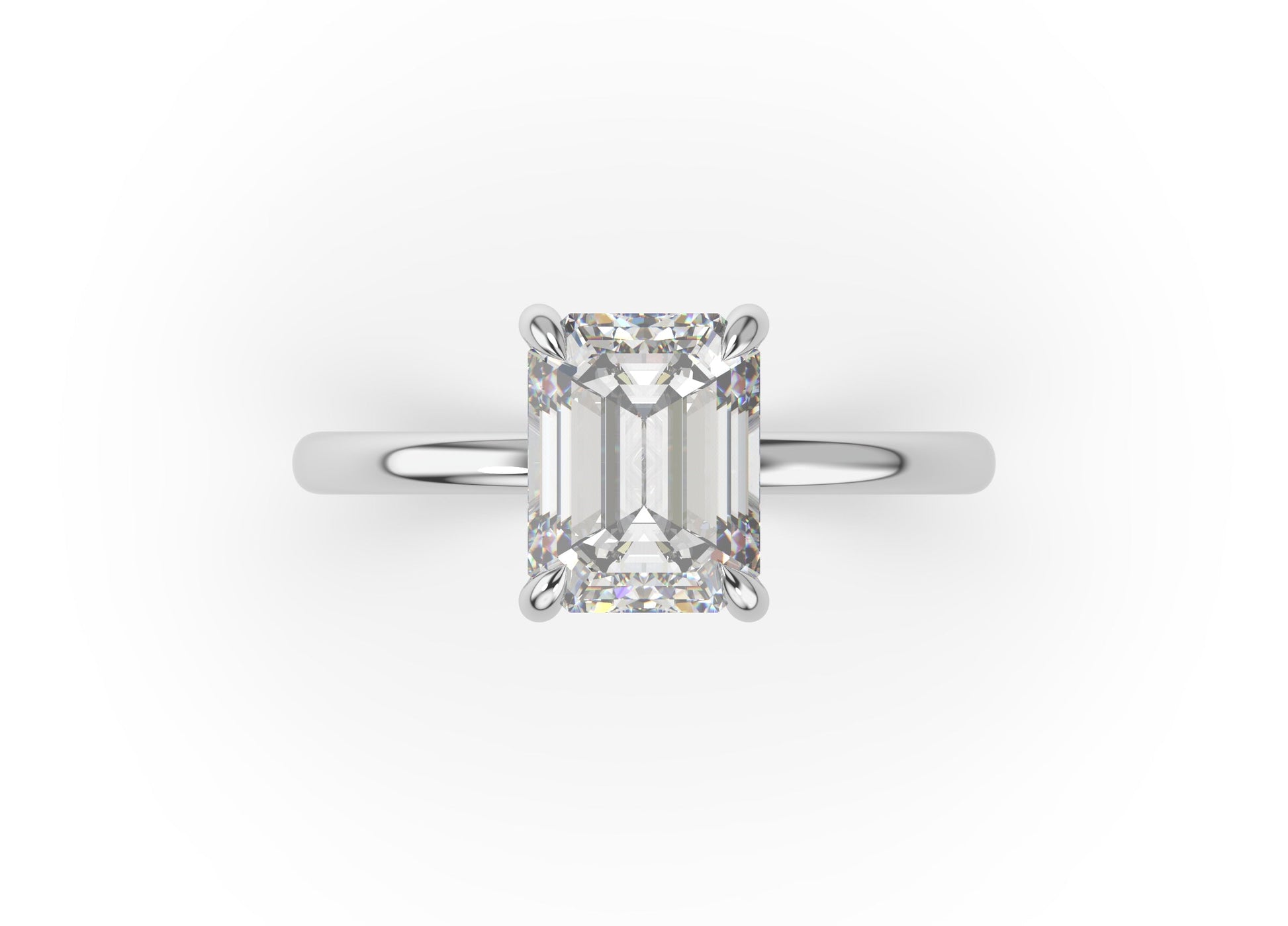 Four Claw White Gold Emerald Solitaire Engagement Ring