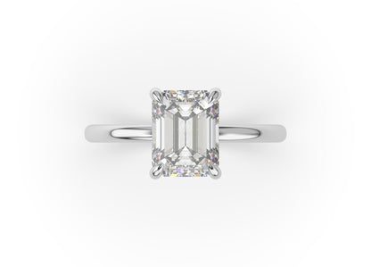 Four Claw White Gold Emerald Solitaire Engagement Ring