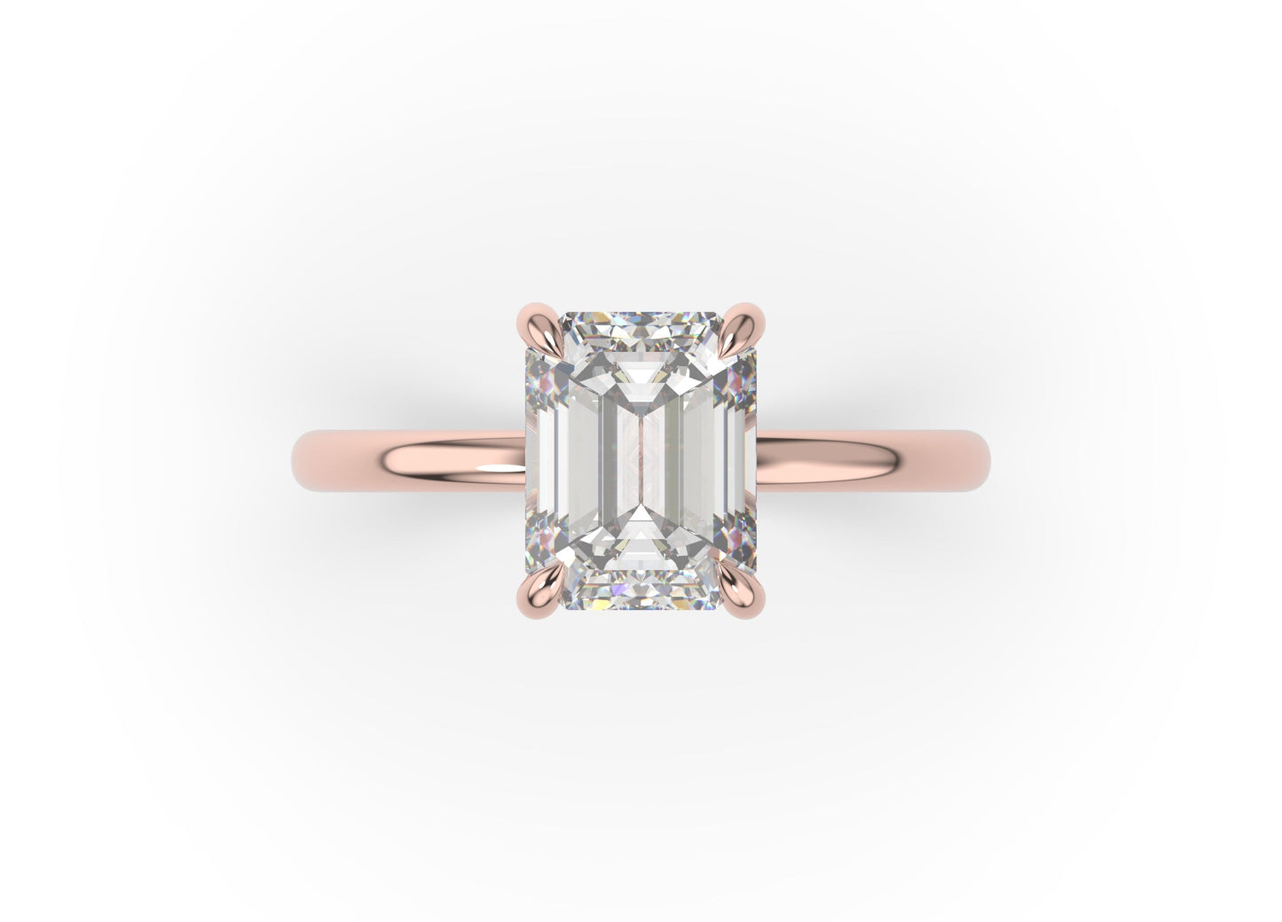 Four Claw Rose Gold Emerald Solitaire Engagement Ring
