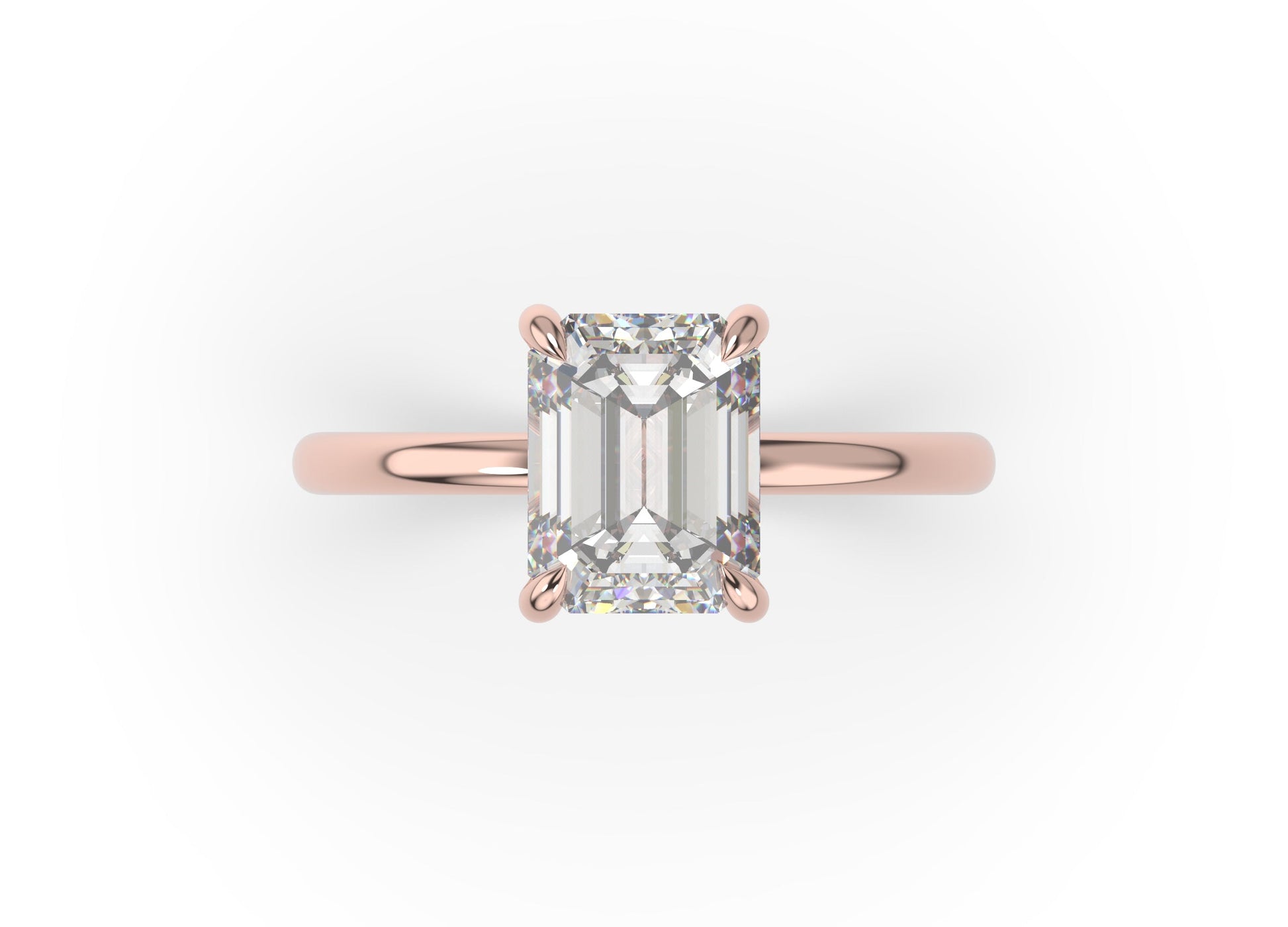 Four Claw Rose Gold Emerald Solitaire Engagement Ring