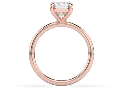 Four Claw Rose Gold Emerald Solitaire Engagement Ring