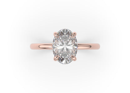 Four Claw Rose Gold Oval Solitaire Engagement Ring