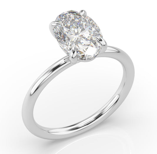 Four Claw White Gold Oval Solitaire Engagement Ring