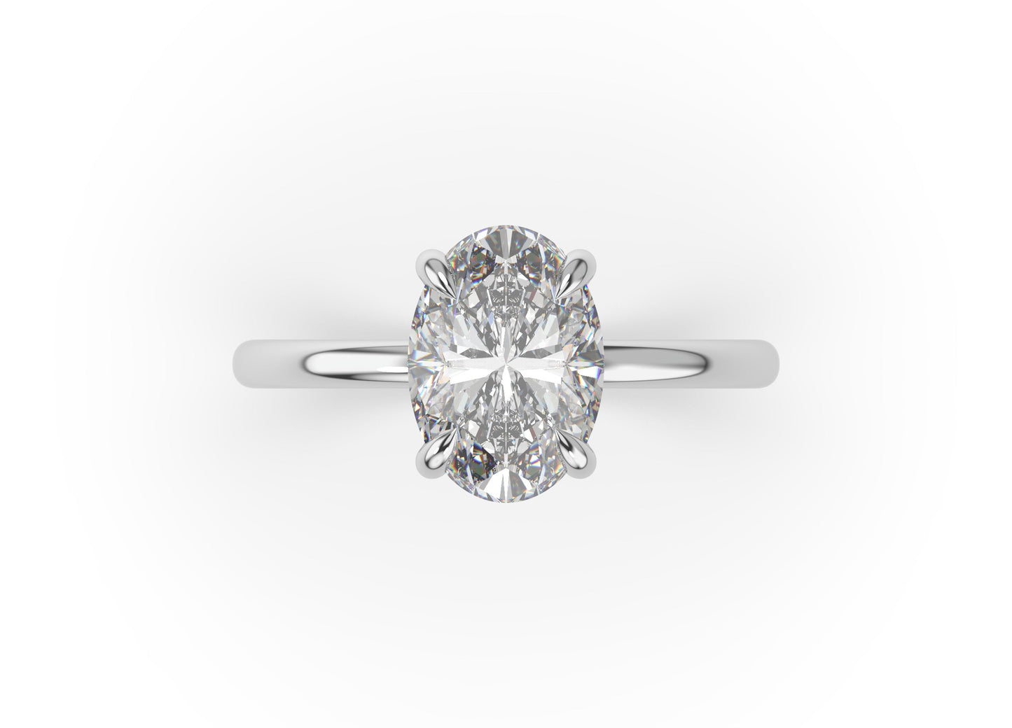 Four Claw White Gold Oval Solitaire Engagement Ring
