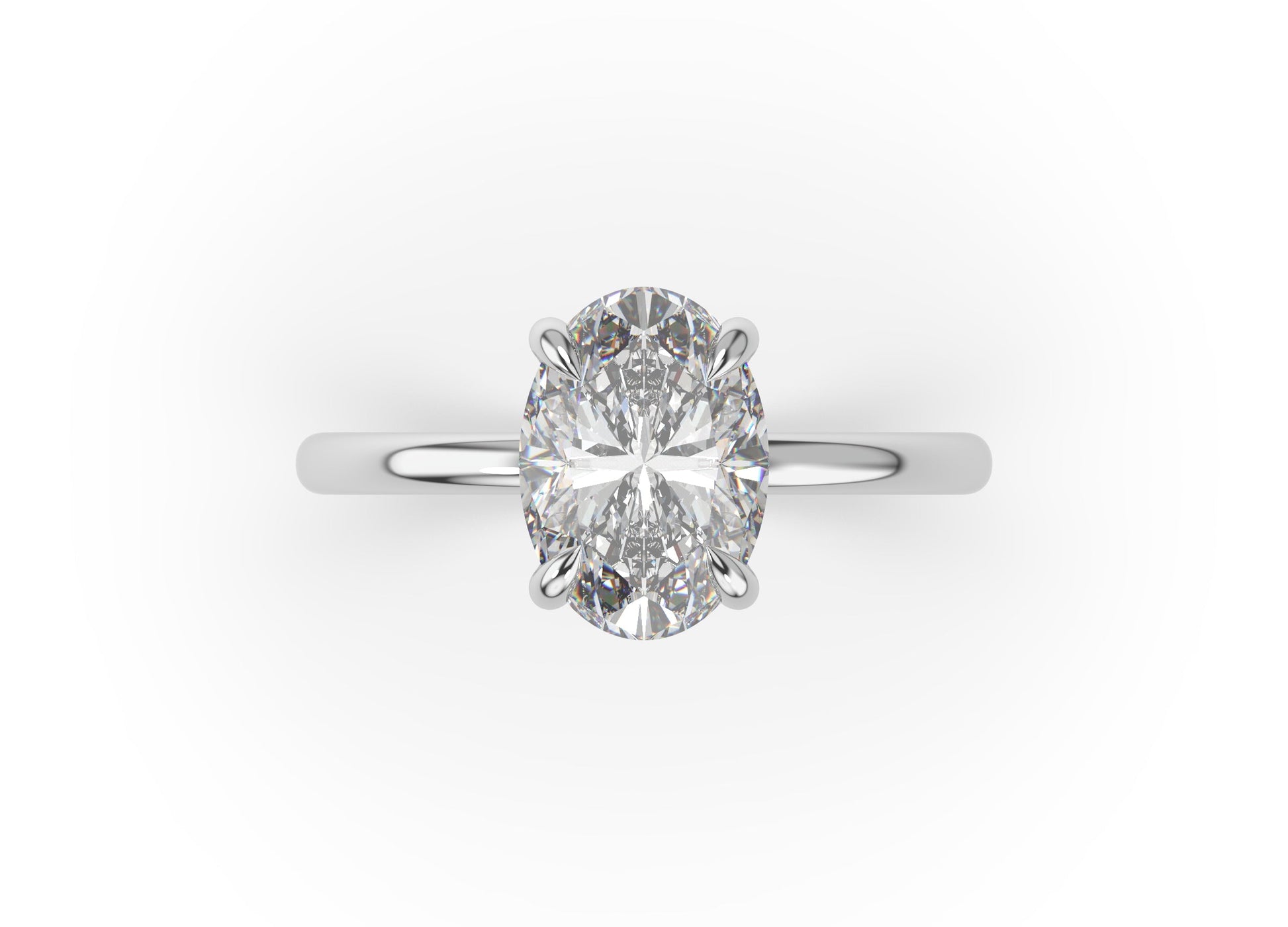 Four Claw White Gold Oval Solitaire Engagement Ring