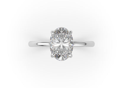 Four Claw White Gold Oval Solitaire Engagement Ring