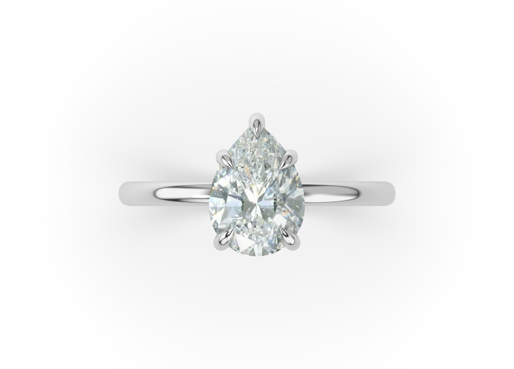 Four Claw White Gold Pear Solitaire Engagement Ring
