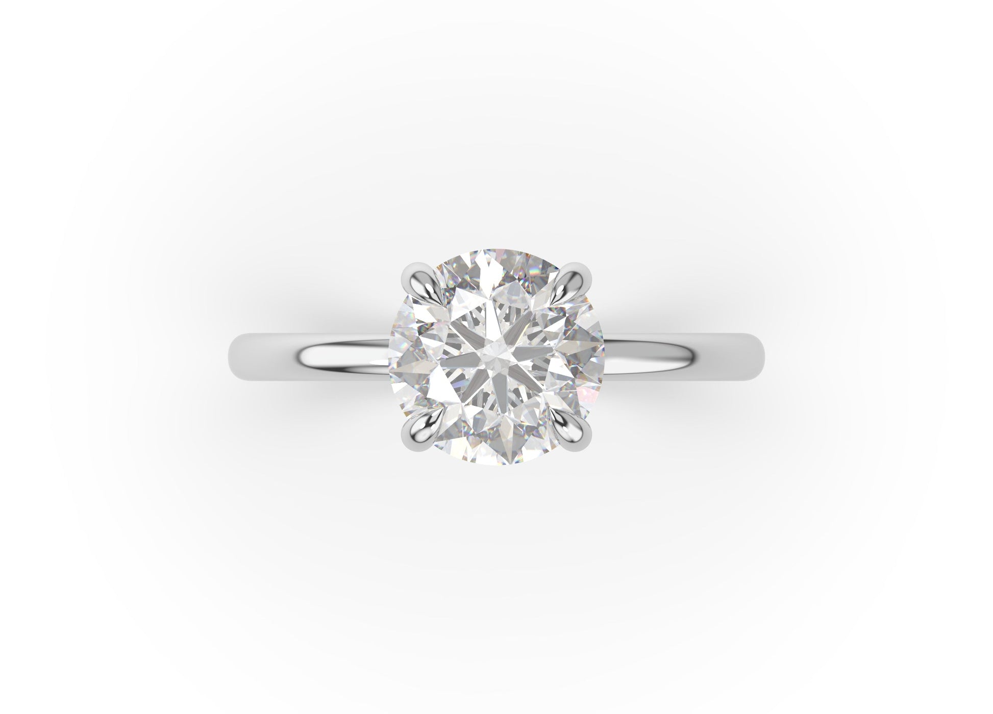 Four Claw Round Brilliant White Gold Solitaire Engagement Ring