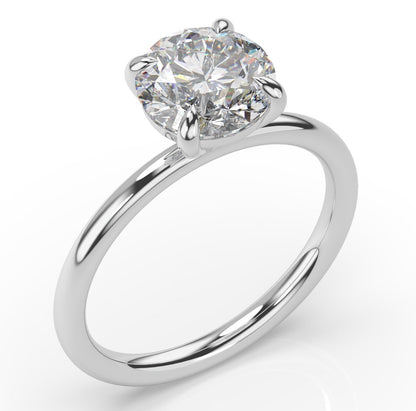 Four Claw Round Brilliant White Gold Solitaire Engagement Ring