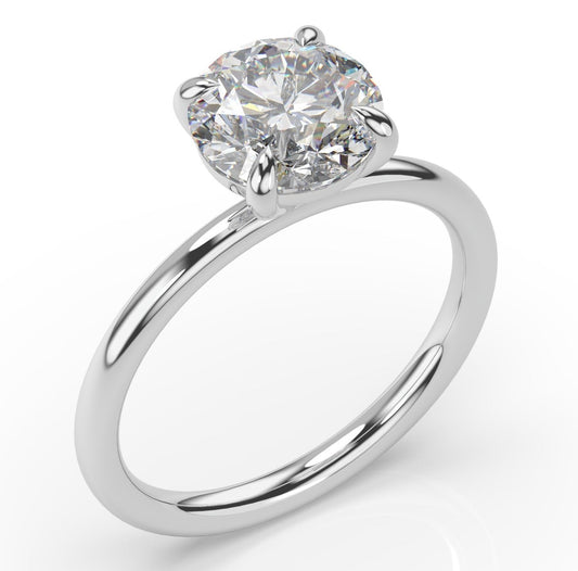 Four Claw Round Brilliant White Gold Solitaire Engagement Ring