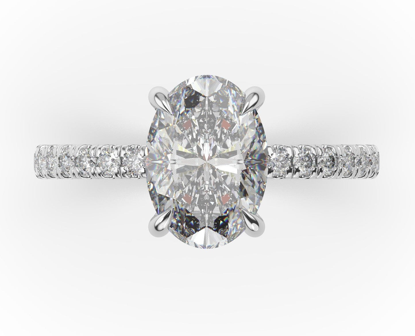 Oval White Gold Claw Set Style Engagement Ring 