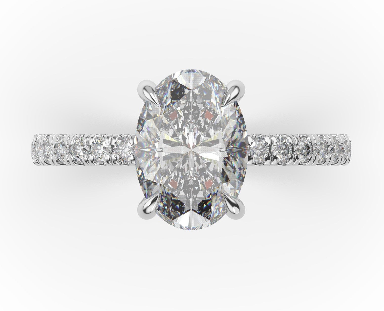 Oval White Gold Claw Set Style Engagement Ring 