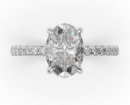 Oval White Gold Claw Set Style Engagement Ring 