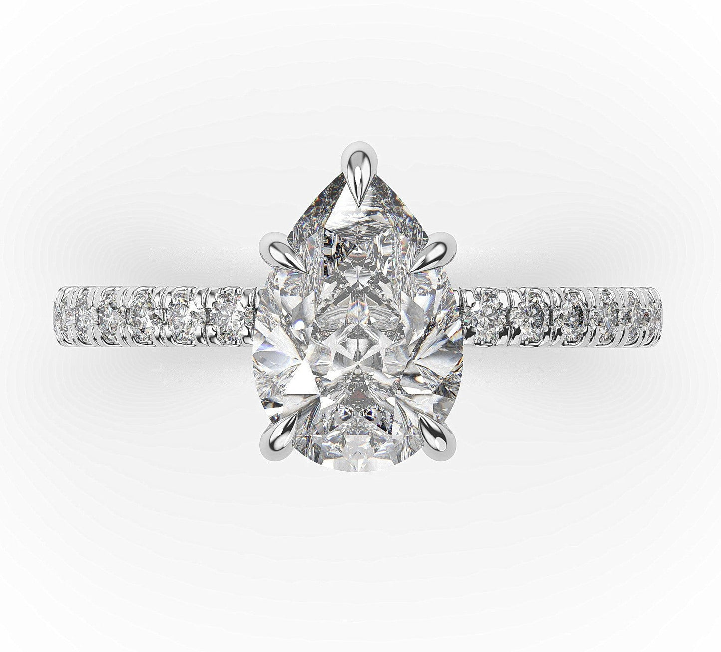 Pear White Gold Claw Set Style Engagement Ring 