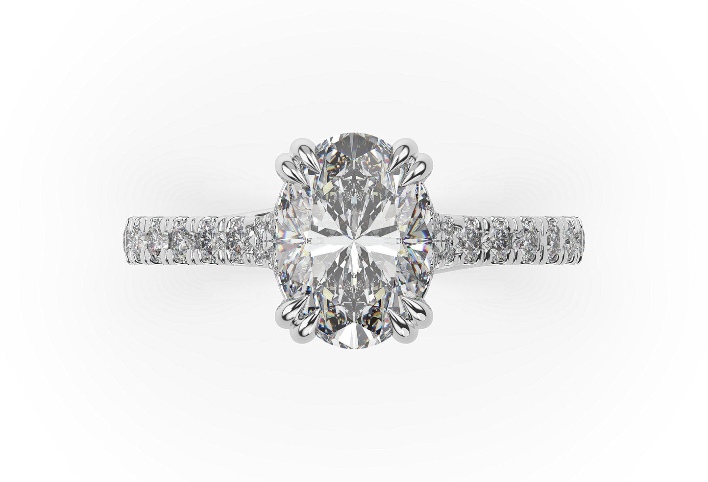 Oval White Gold Claw Set Hidden Halo Style Engagement Ring
