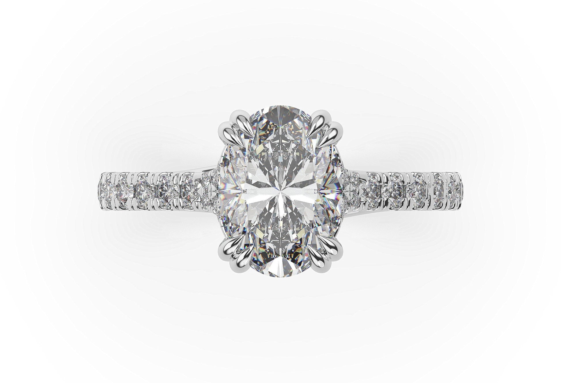 Oval White Gold Claw Set Hidden Halo Style Engagement Ring