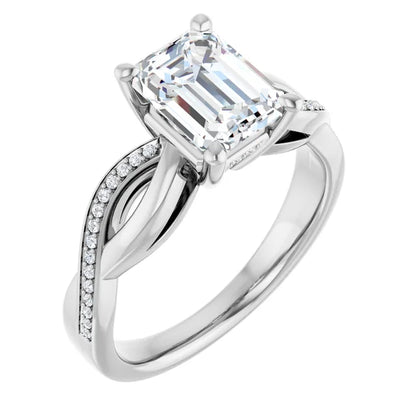 Emerald White Gold Claw Set Twist Style Engagement Ring 