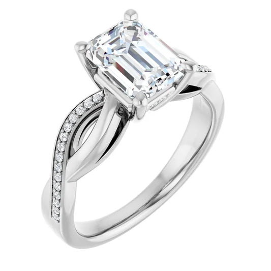 Emerald White Gold Claw Set Twist Style Engagement Ring 