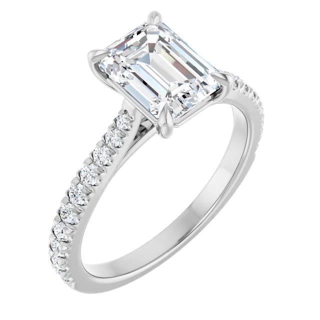 Emerald White Gold Claw Set Style Engagement Ring