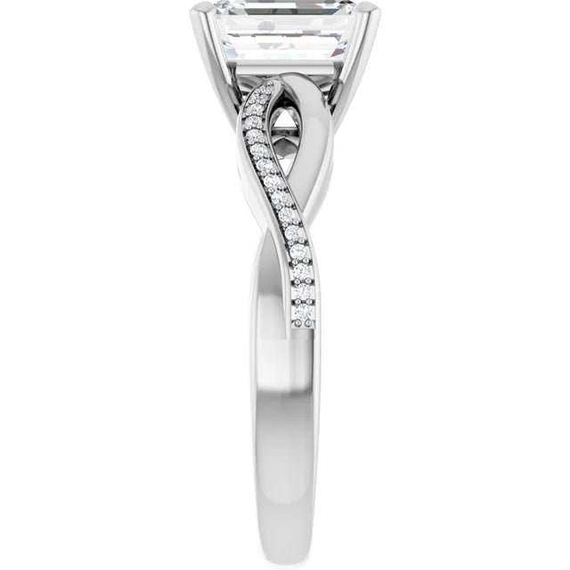 Emerald White Gold Claw Set Twist Style Engagement Ring 