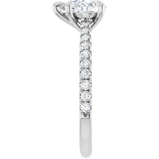 Pear White Gold Claw Set Style Engagement Ring