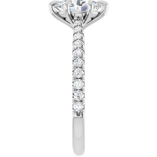 Oval White Gold Claw Set Style Engagement Ring