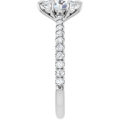 Oval White Gold Claw Set Style Engagement Ring