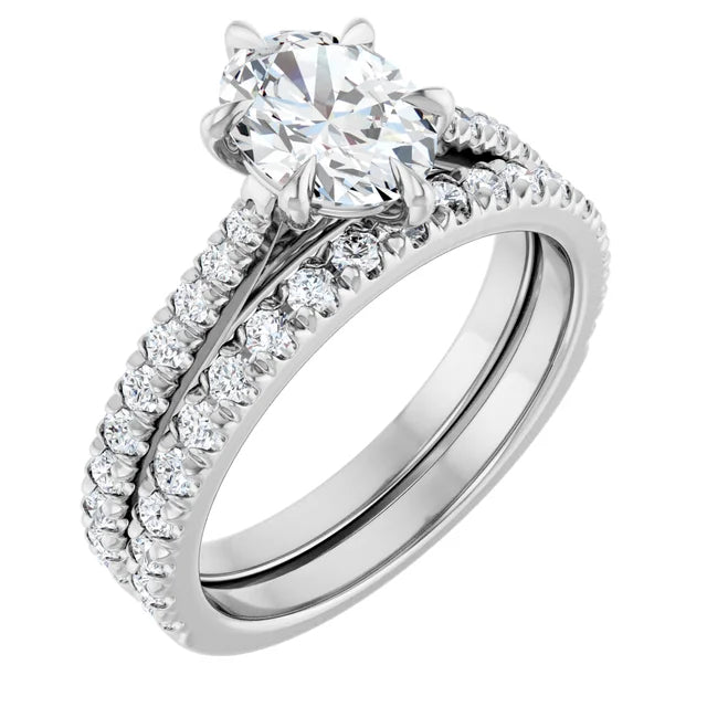 Oval White Gold Claw Set Style Engagement Ring