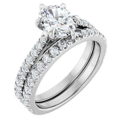 Oval White Gold Claw Set Style Engagement Ring